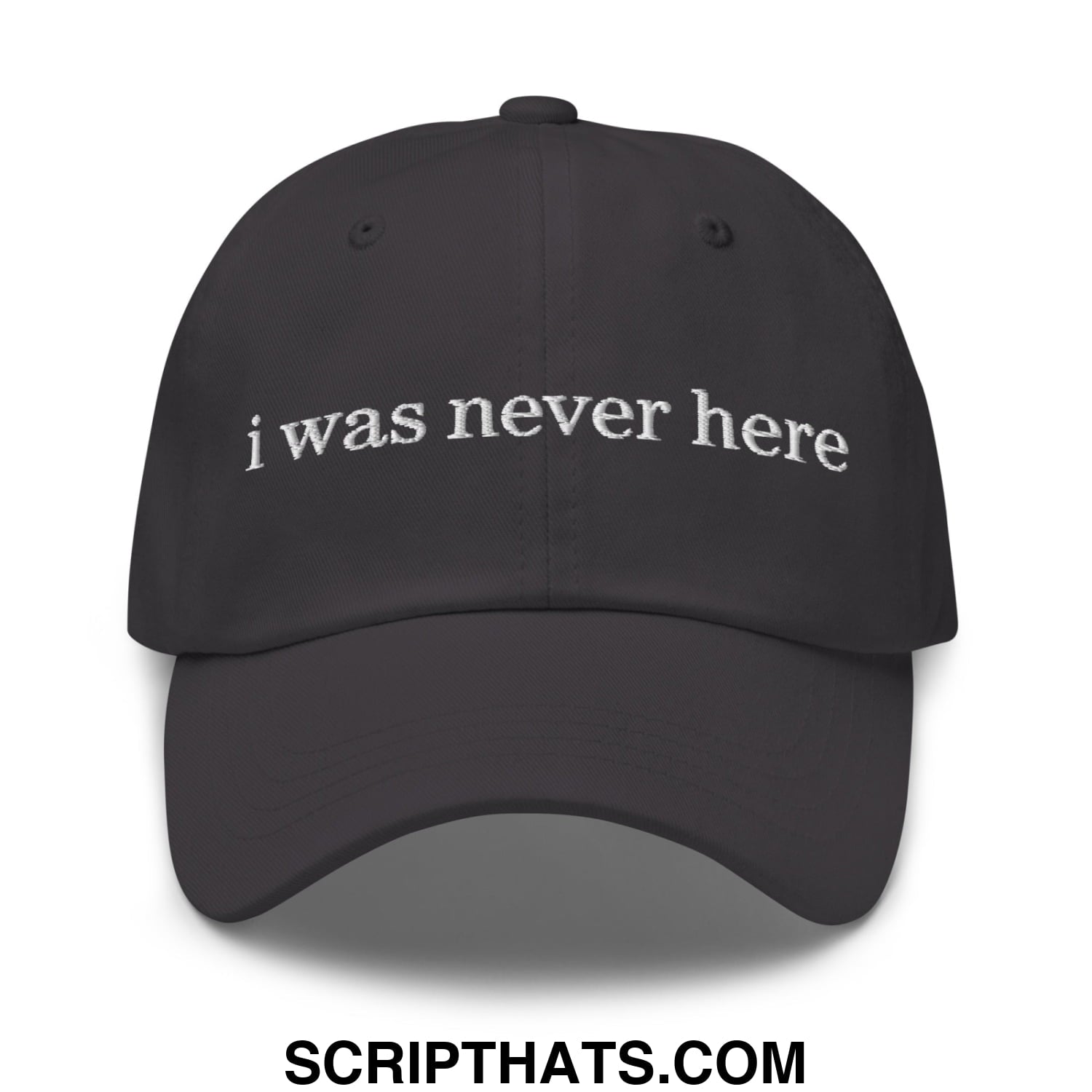 Black embroidered unstructured dad hat with white i was never here text for casual everyday wear