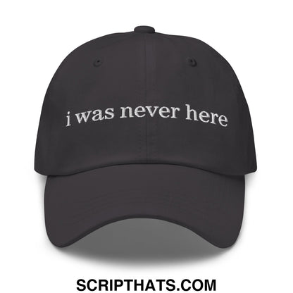 Black embroidered unstructured dad hat with white i was never here text for casual everyday wear