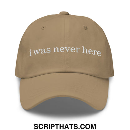 Beige unstructured dad hat with white embroidered text i was never here on the front perfect for casual wear