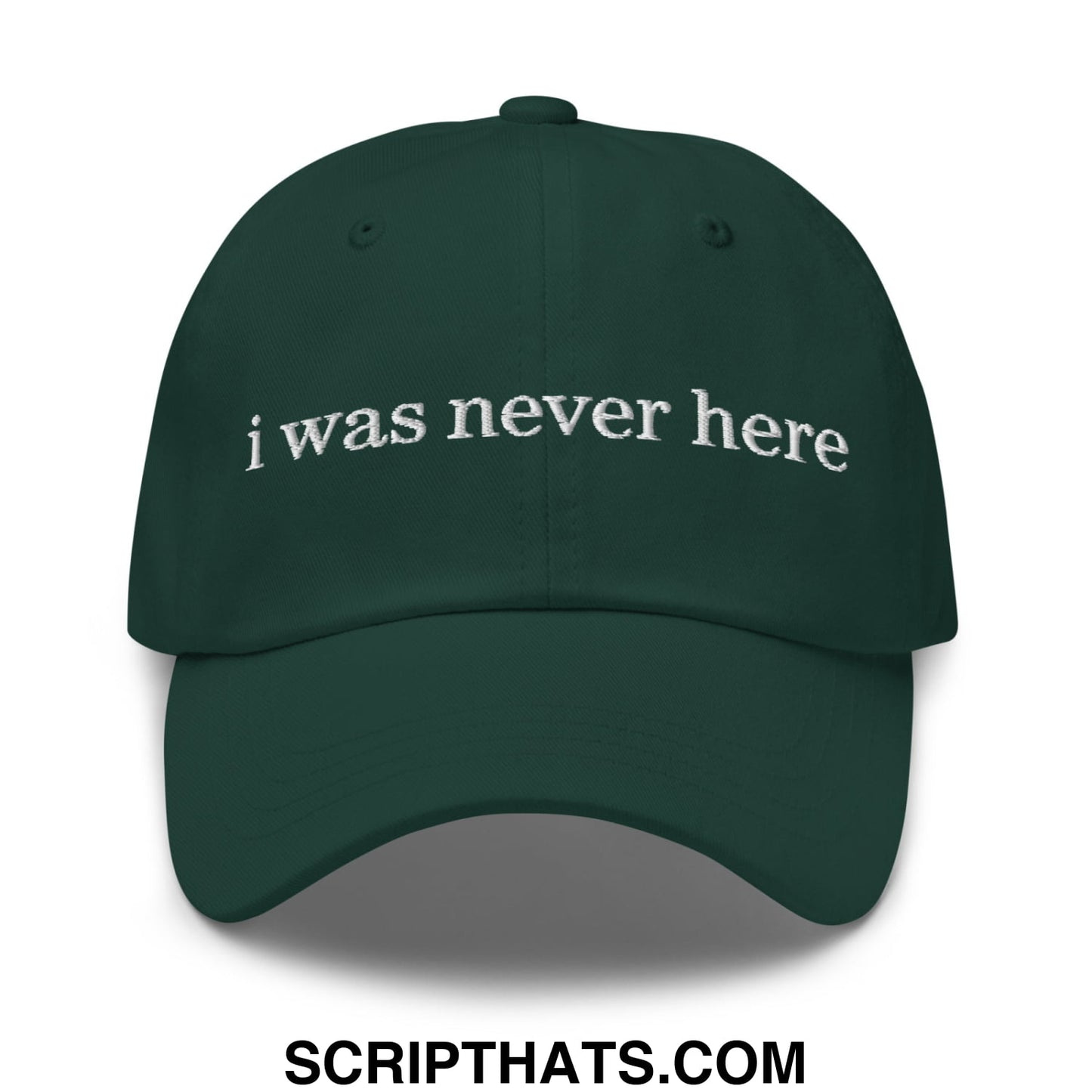 Dark green unstructured dad hat with white embroidered text i was never here ideal for casual wear