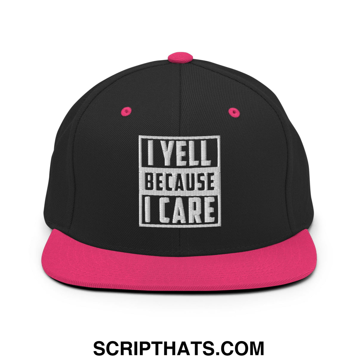 Black snapback cap with vibrant pink brim and white embroidered i yell because i care text on front in bold block letters