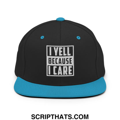 Black snapback cap with teal brim and button featuring embroidered white bold text i yell because i care