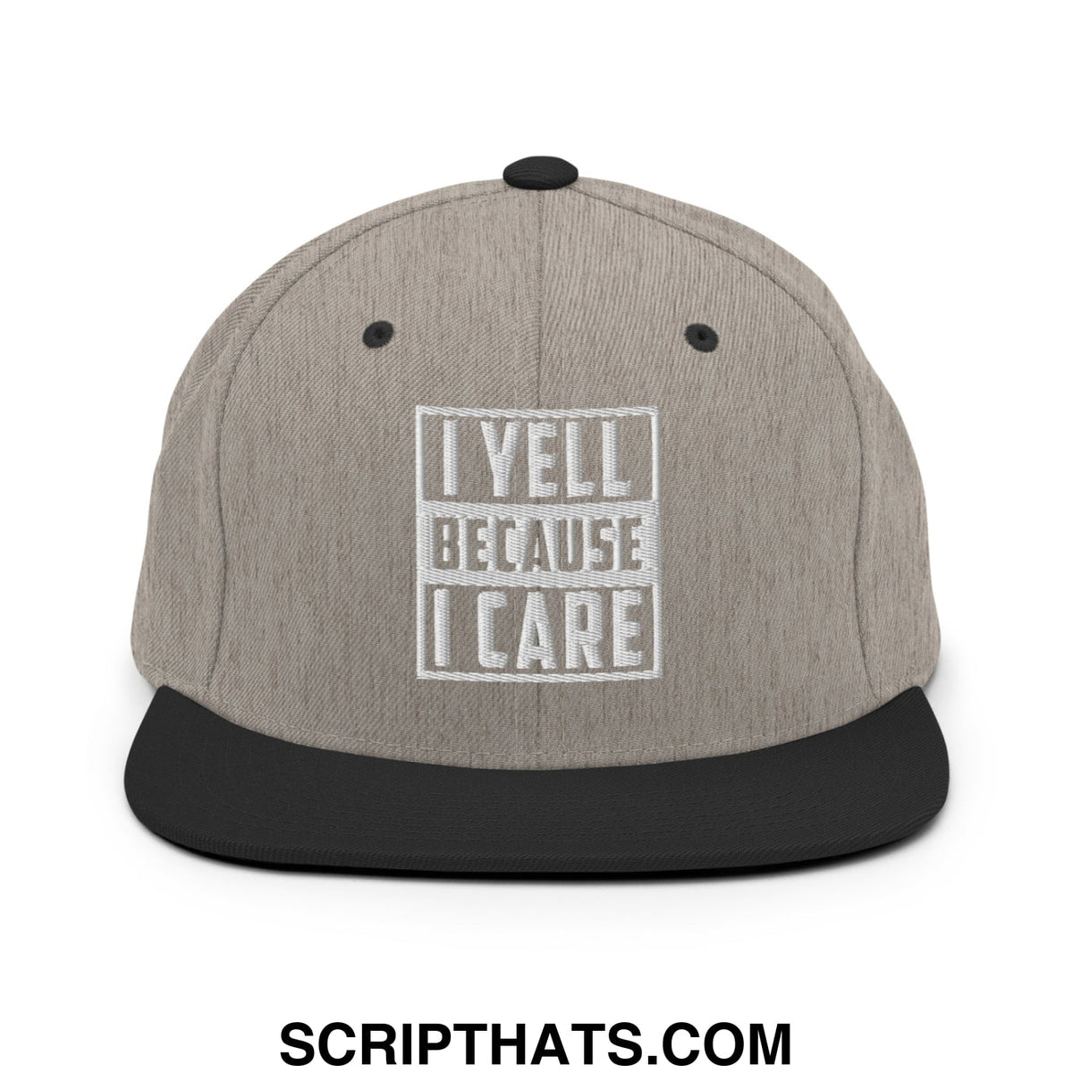 Gray and black snapback hat with white embroidered i yell because i care text inside a rectangular border
