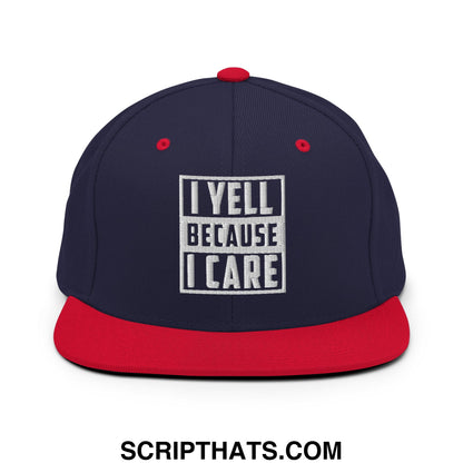 Navy blue and red snapback cap with white embroidered text i yell because i care inside a rectangular border