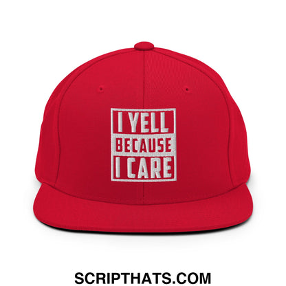 Red flat bill brim snapback hat with white embroidered i yell because i care text inside a rectangular border