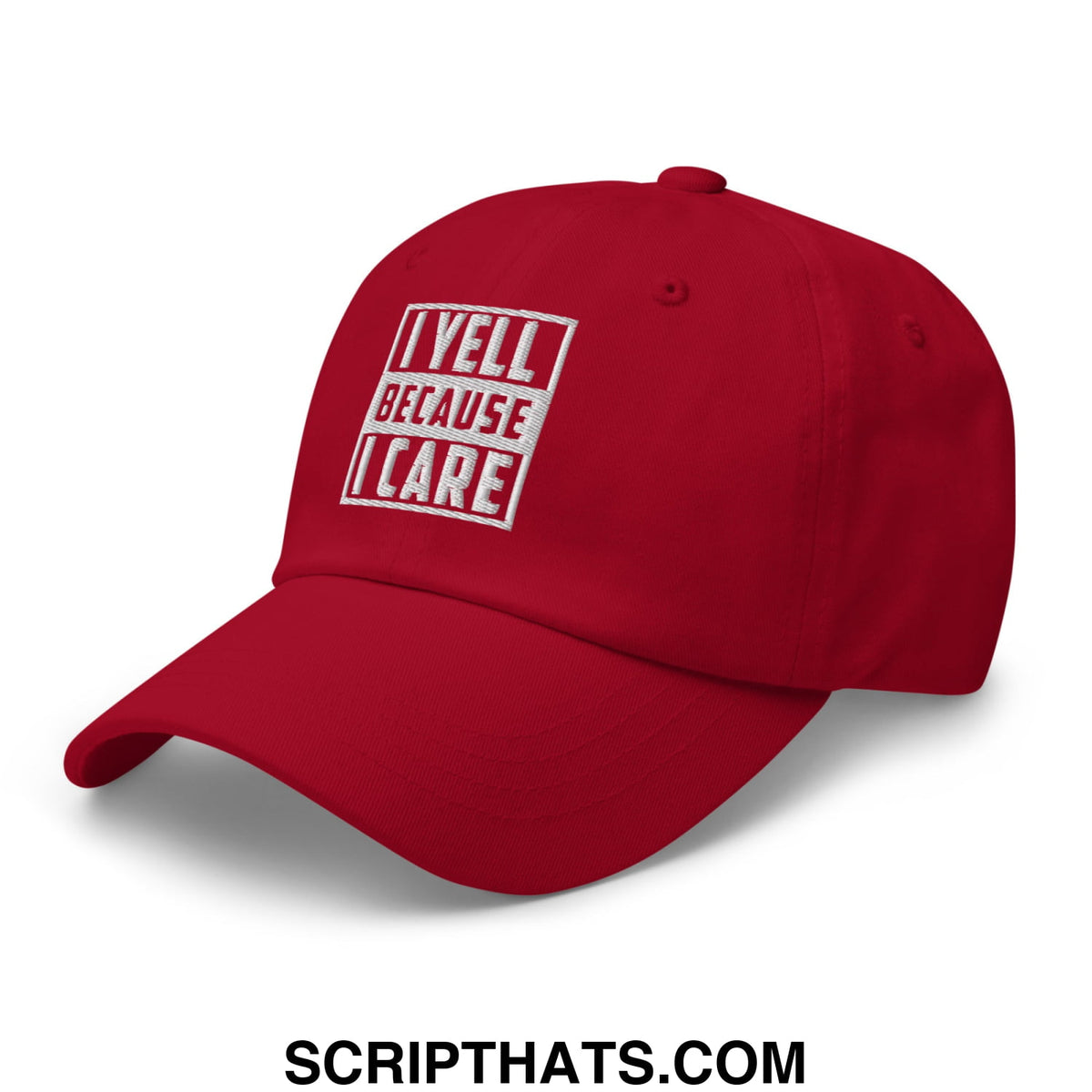 Red embroidered unstructured dad hat with white rectangular text i yell because i care for casual wear