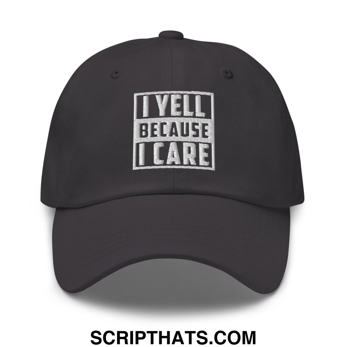 Black unstructured dad hat with white embroidered text i yell because i care in bold blocky font