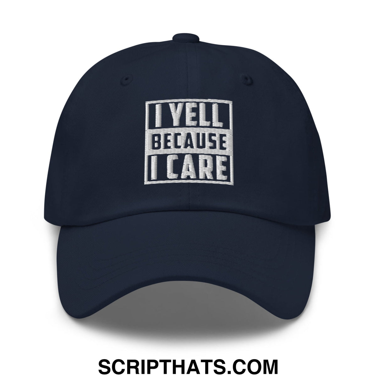 Navy blue unstructured dad hat with white embroidered bold text i yell because i care for casual wear