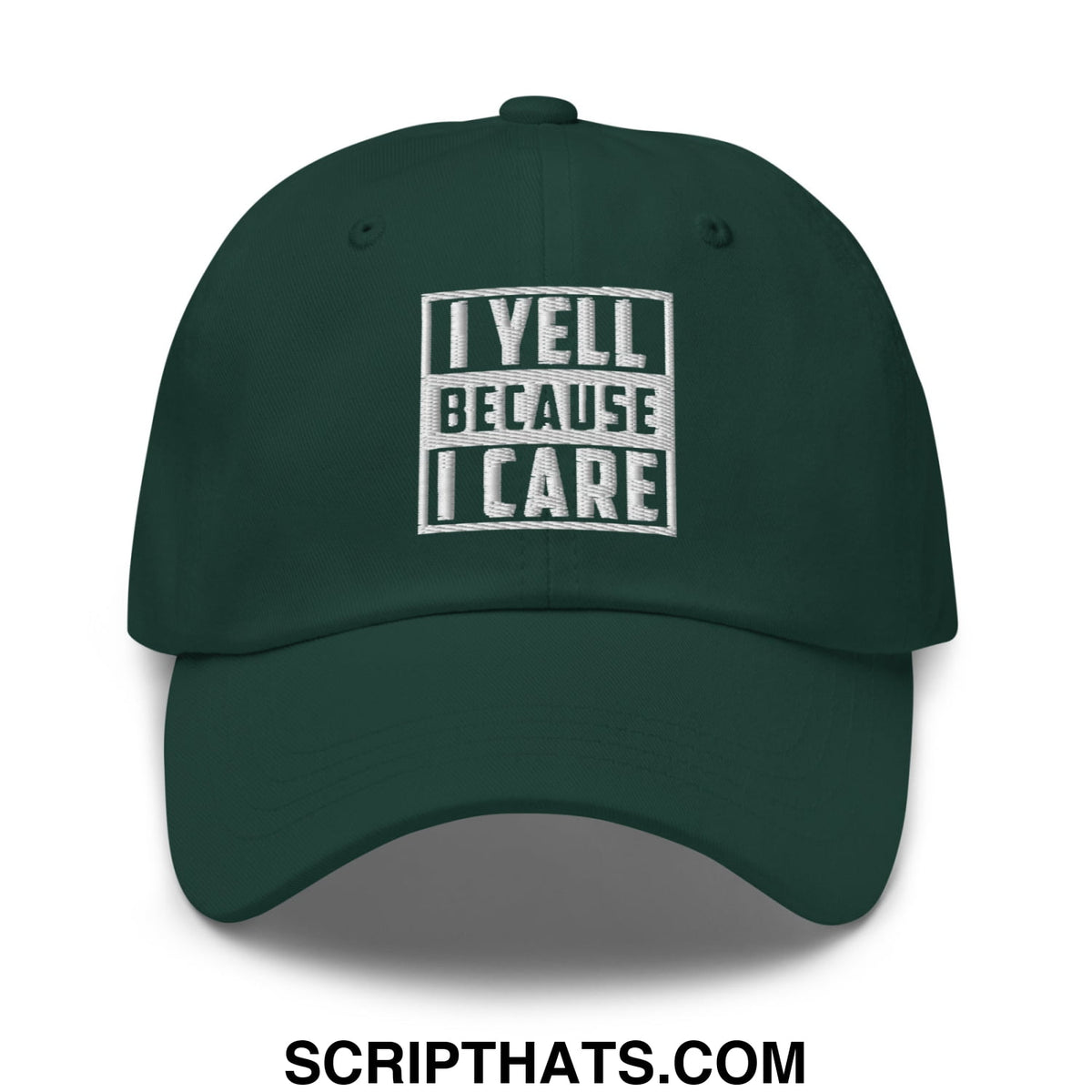 Dark green embroidered unstructured dad hat with white text i yell because i care in blocky outlined font