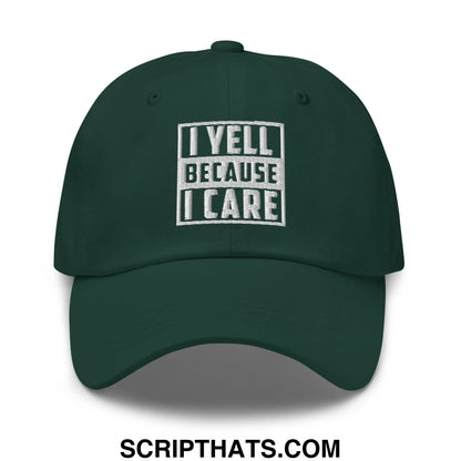 Dark green embroidered unstructured dad hat with white text i yell because i care in blocky outlined font