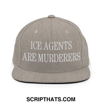 A gray snapback hat with white embroidered ice agents are murderers text on the front flat bill brim design