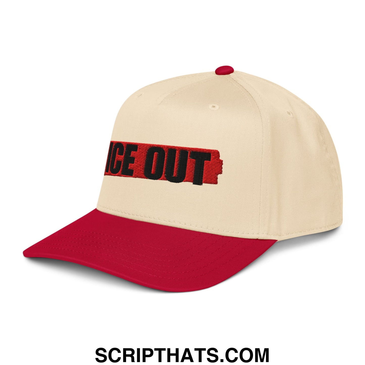 Cream-colored baseball snapback hat with red brim and bold black ice out embroidery on front panel