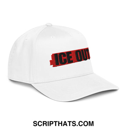 White baseball snapback hat with bold ice out embroidered in black on the front against a red textured background