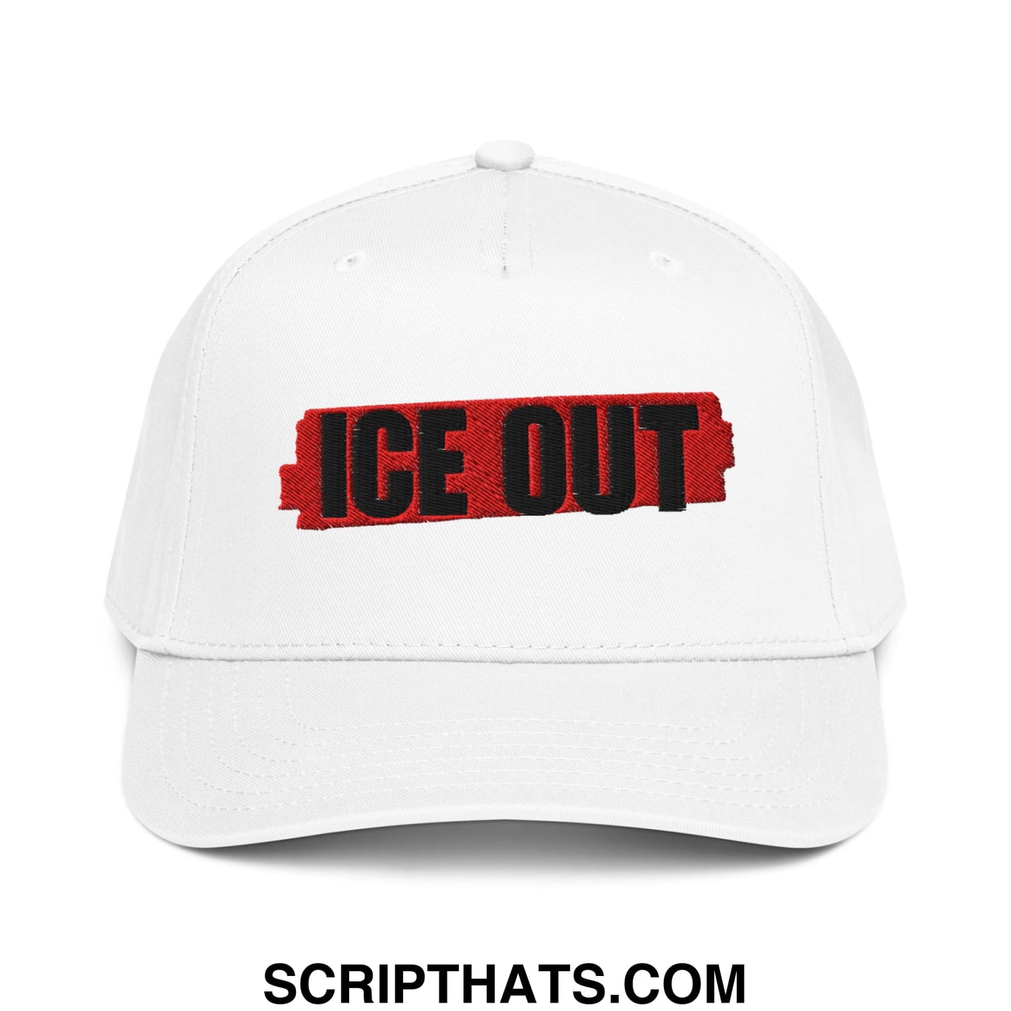 White baseball snapback hat with bold black ice out embroidery on red textured background