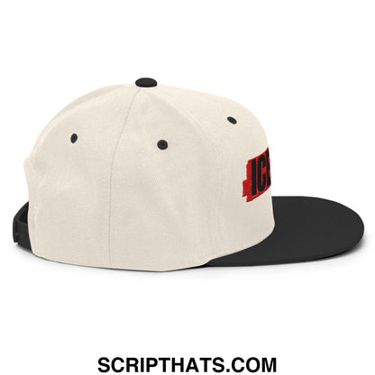 Off-white and black ice out embroidered flat bill brim snapback hat with a red logo embroidered on the side