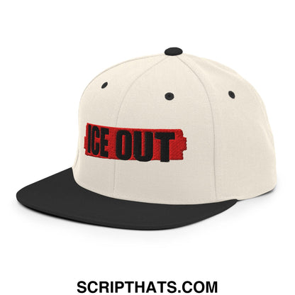 Cream-colored ice out embroidered snapback hat with black flat bill brim and bold red and black lettering logo
