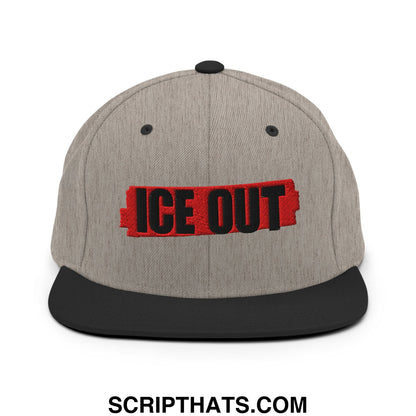 Gray snapback hat with black flat bill brim and bold red embroidered ice out logo in a streetwear style design