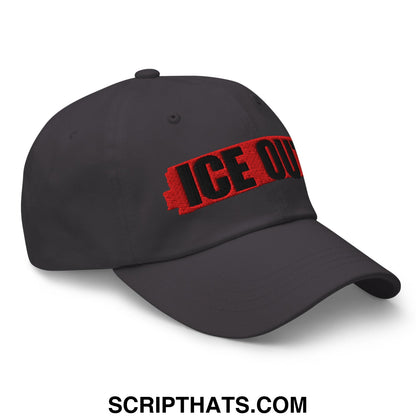 Dark gray unstructured dad hat with bold red and black embroidered ice out lettering on the front panel