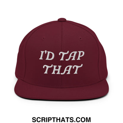 Maroon embroidered flat bill brim snapback hat with white id tap that text in a casual streetwear style