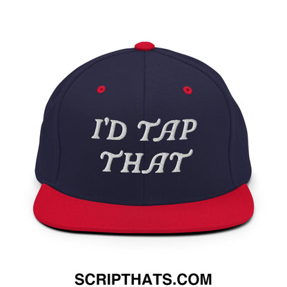 Navy blue snapback hat with red brim button and white embroidered text id tap that flat bill design