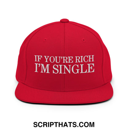 Red snapback hat with white embroidered if youre rich im single text and flat bill brim design