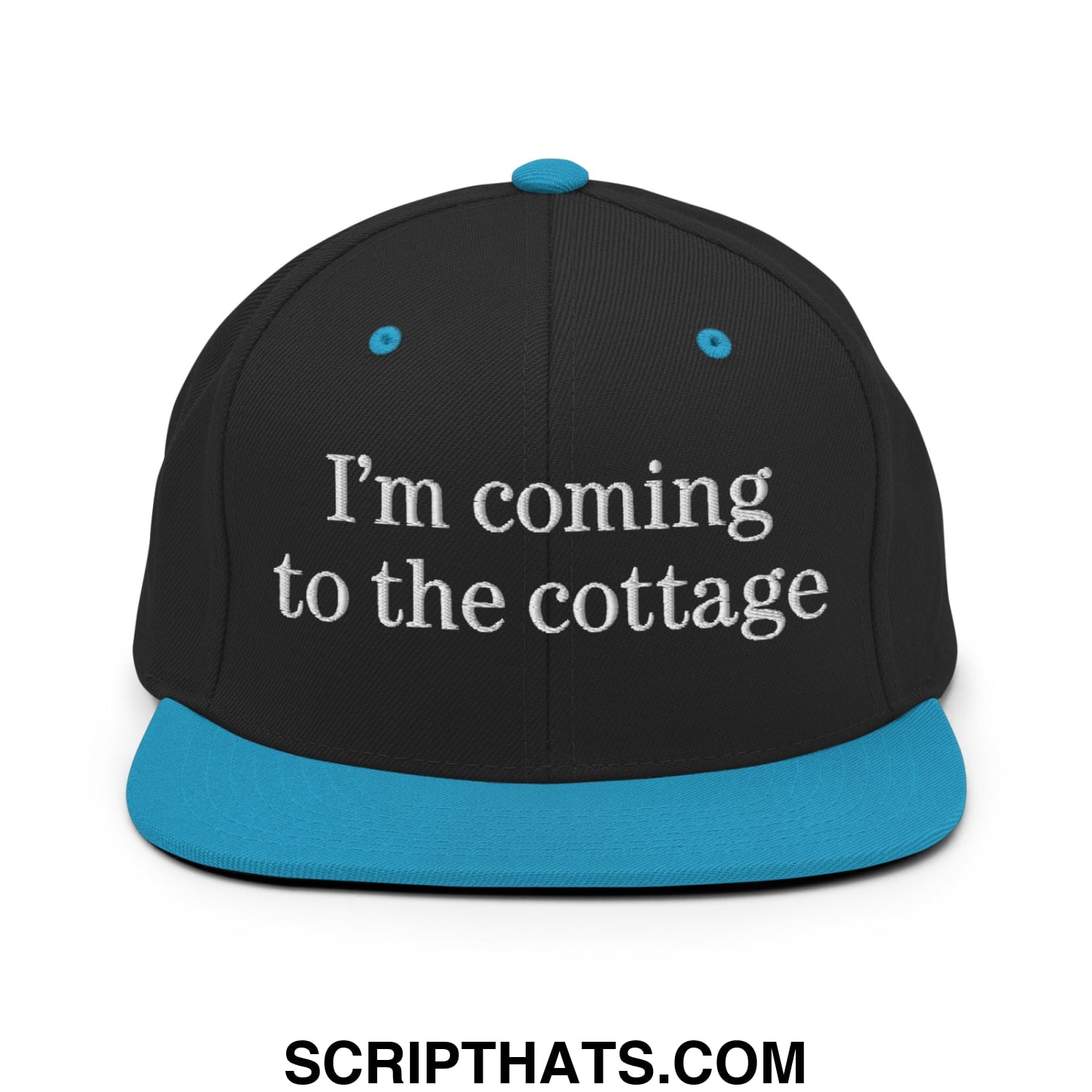Black snapback cap with teal brim and button embroidered with im coming to the cottage text