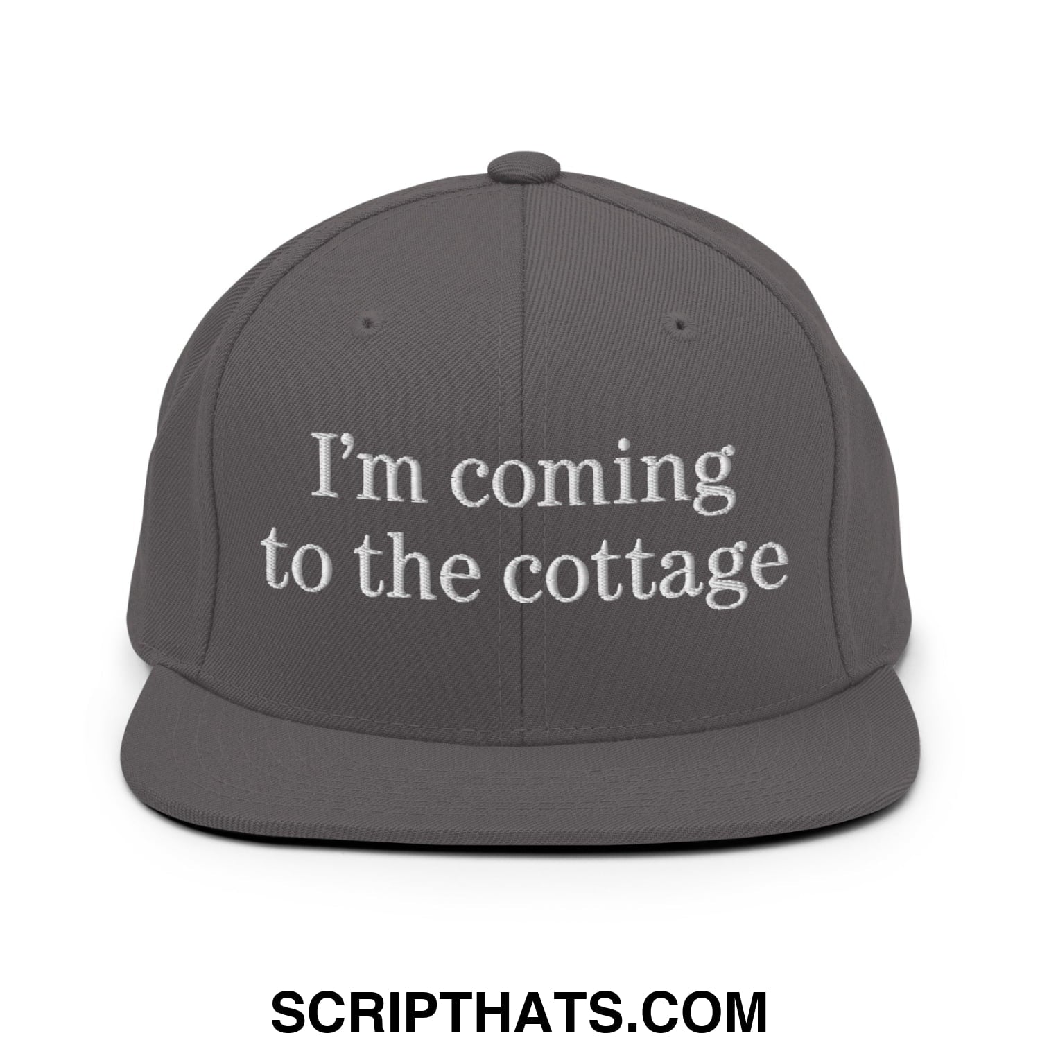 Gray snapback cap with white embroidered text reading im coming to the cottage on flat bill brim