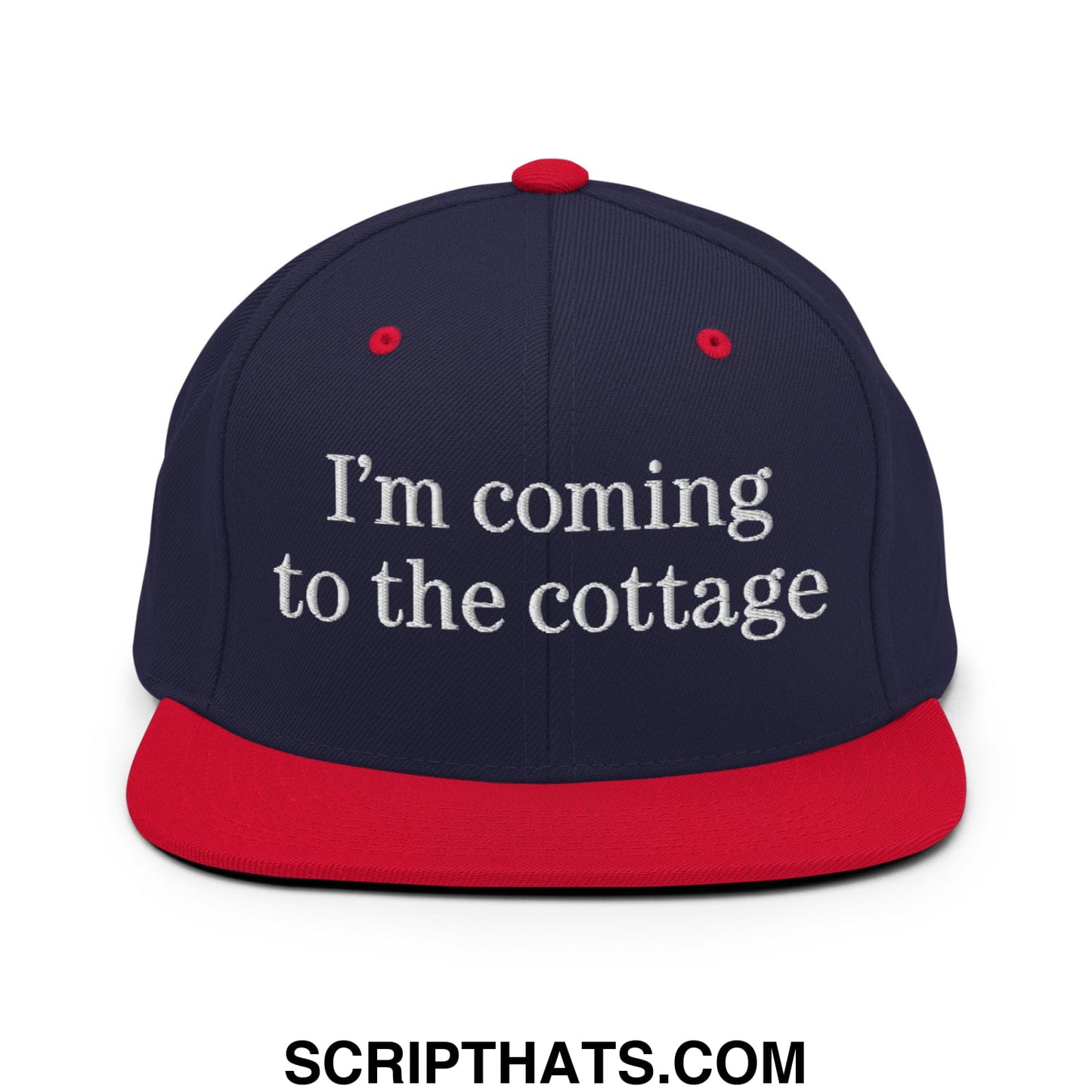 Navy blue snapback hat with red brim and white embroidered text saying im coming to the cottage flat bill brim