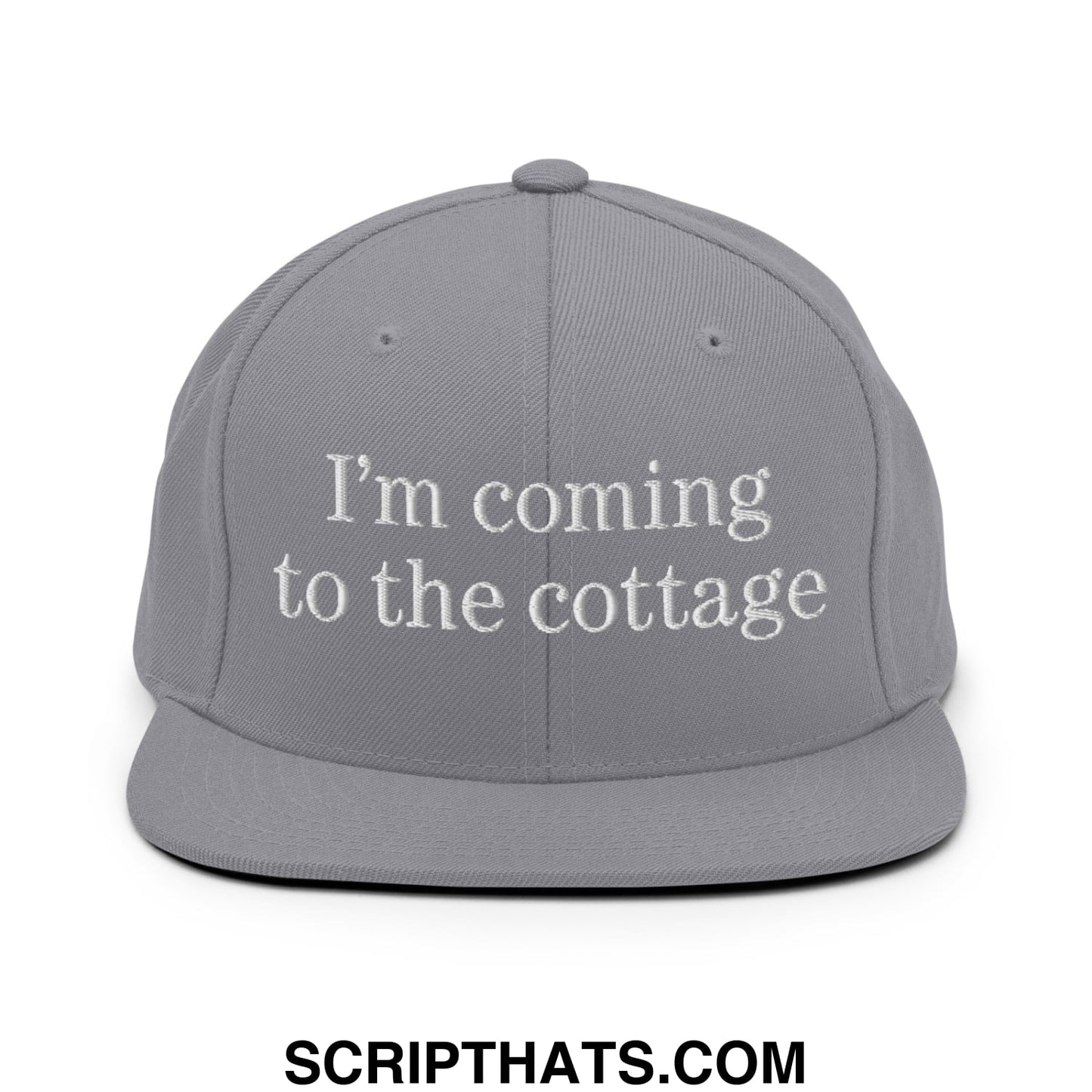 Gray snapback hat with white embroidered text reading im coming to the cottage flat bill brim style
