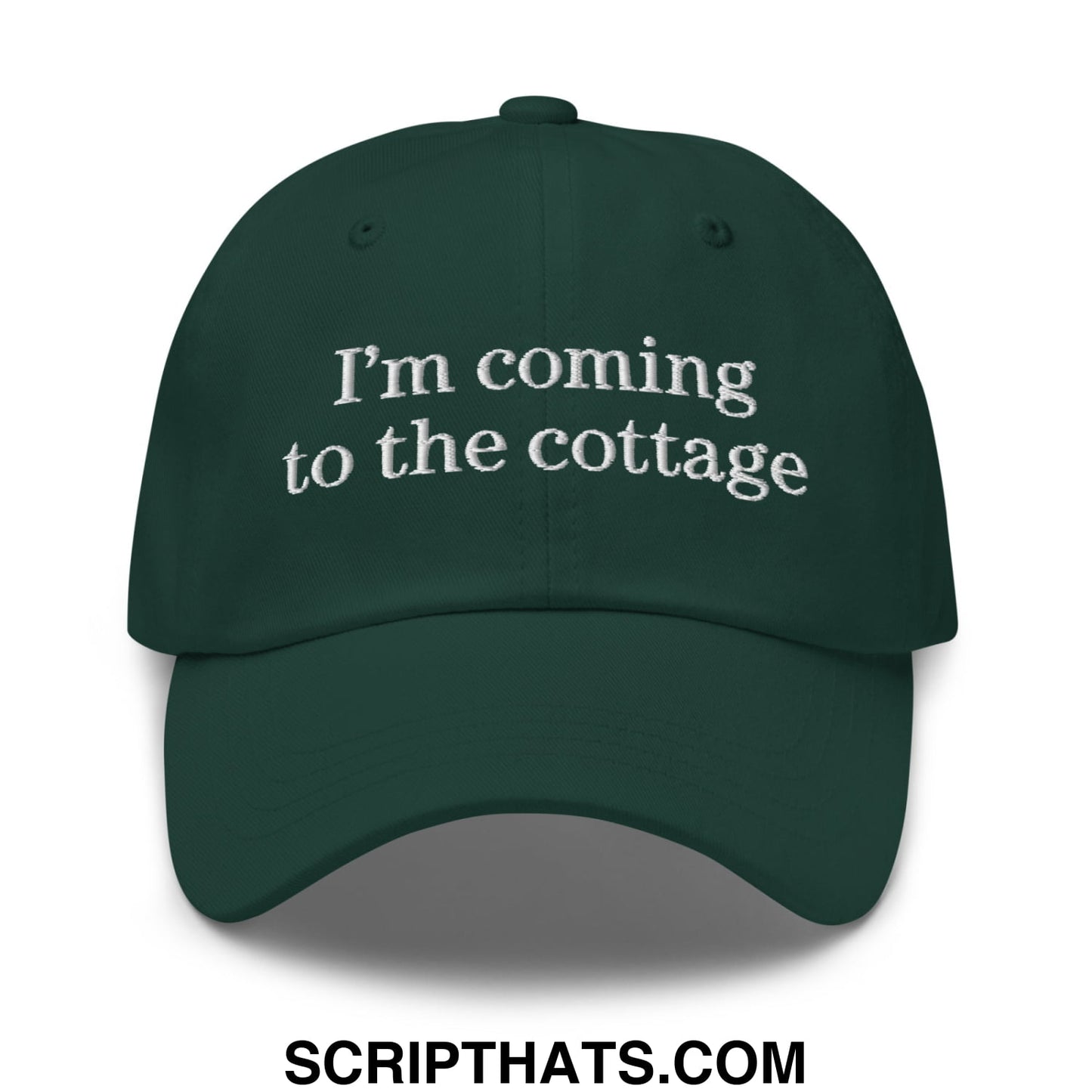 Dark green unstructured dad hat with white embroidered text i’m coming to the cottage for casual wear