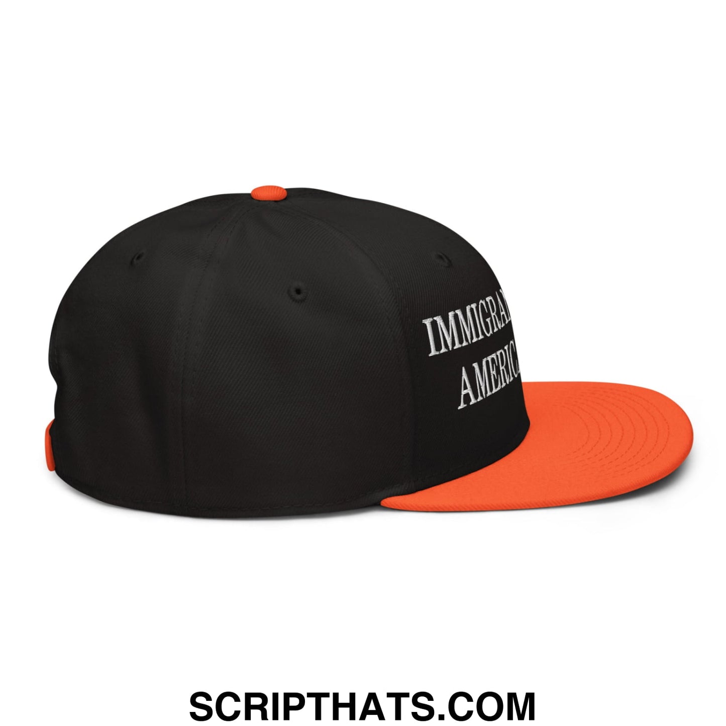 Black and orange snapback cap with white embroidered text immigrant america on the side flat brim design