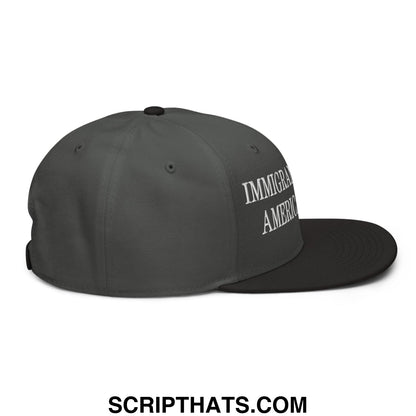 Dark gray snapback cap with white embroidered immigrant america text on the side flat brim bill hat