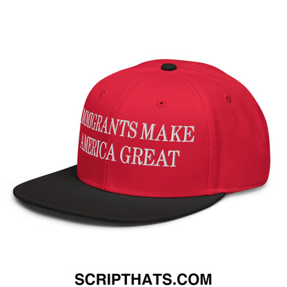 Red and black snapback hat with white embroidered text reading immigrants make america great on front panel