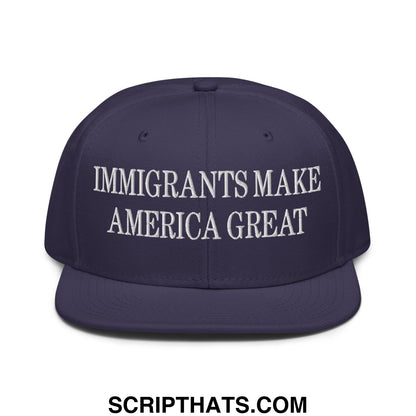 Navy blue snapback cap with white embroidered text reading immigrants make america great flat brim bill design