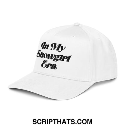 White embroidered cotton baseball snapback hat with black text reading in my showgirl era on the front