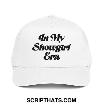 White baseball snapback hat with black embroidered text reading in my showgirl era on front panel