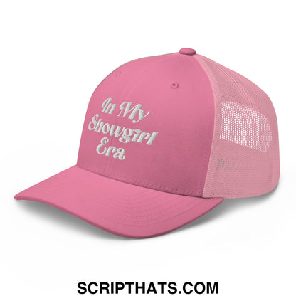 Pink mesh trucker hat with white embroidered text in my showgirl era on front panel for casual wear