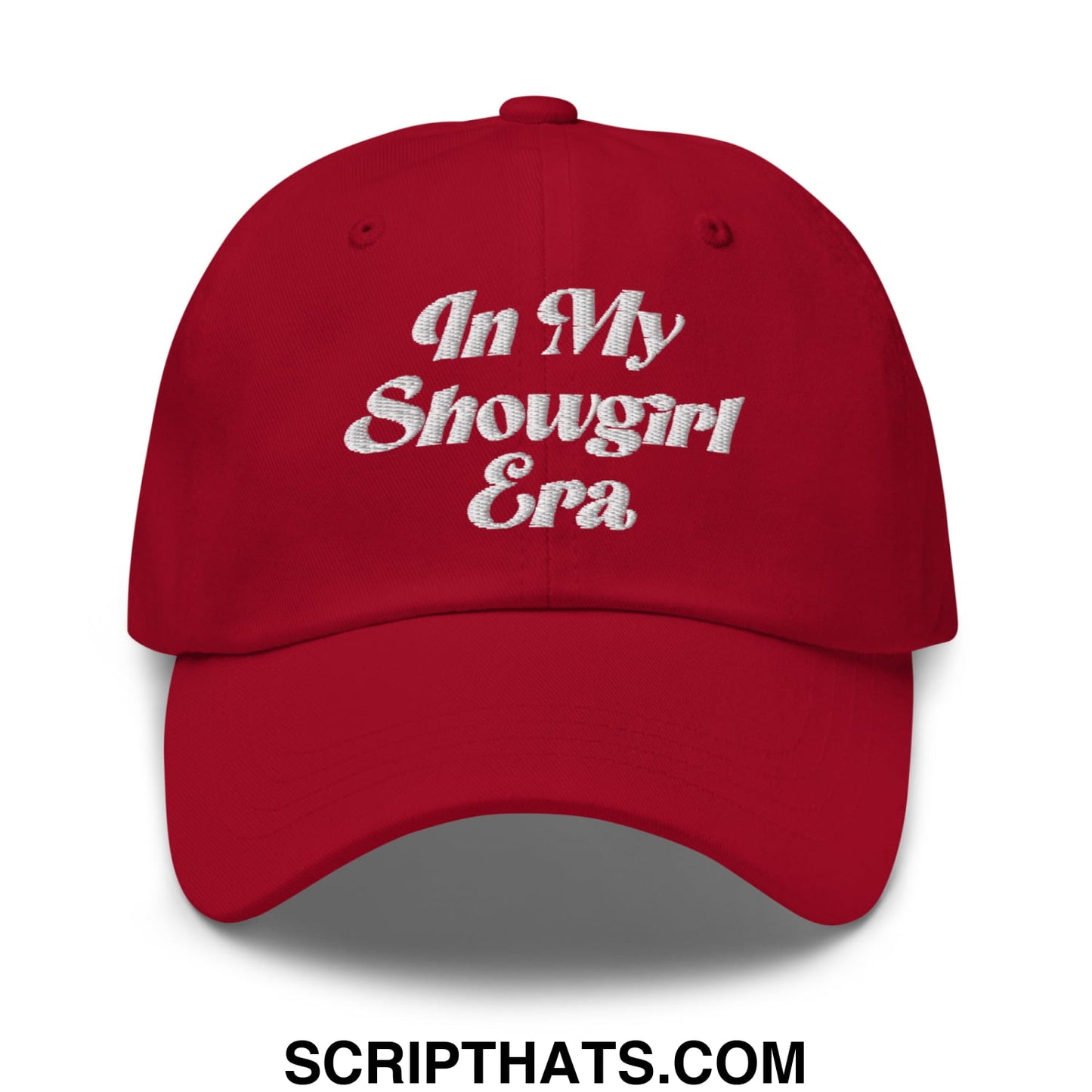 Red unstructured dad hat with white embroidered in my showgirl era text perfect for casual wear