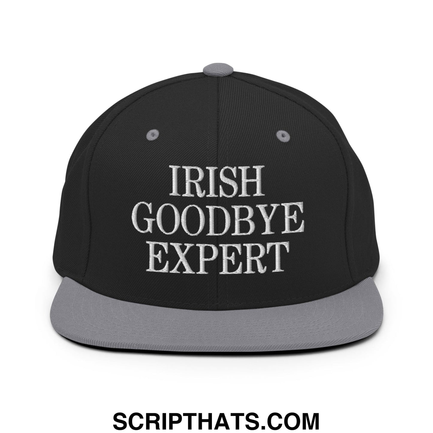 Black snapback cap with gray brim and embroidered white text reading irish goodbye expert flat bill brim hat