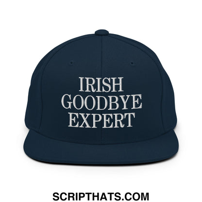 Navy blue snapback hat with white embroidered irish goodbye expert text and flat bill brim design