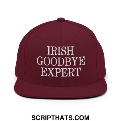 Maroon flat bill brim snapback hat with white embroidered irish goodbye expert text for casual wear