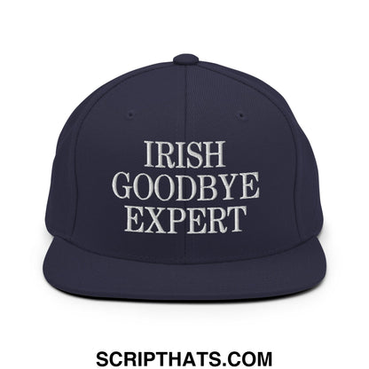 Navy blue snapback hat with white embroidered irish goodbye expert text flat bill brim style
