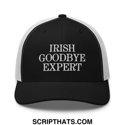 Black and white mesh trucker hat with irish goodbye expert embroidered in silver thread on the front