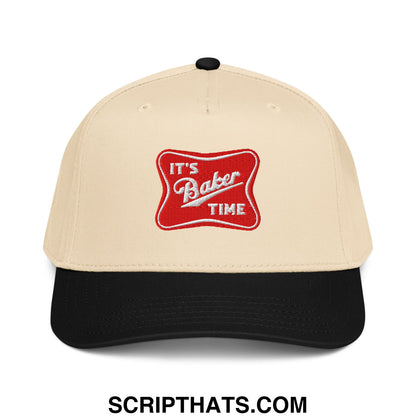 Beige and black baseball snapback hat with a red embroidered patch reading its baker time in white cursive text