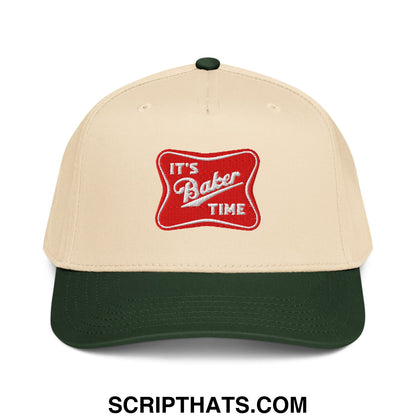 Beige and dark green baseball snapback hat with red embroidered patch reading its baker time in white cursive text