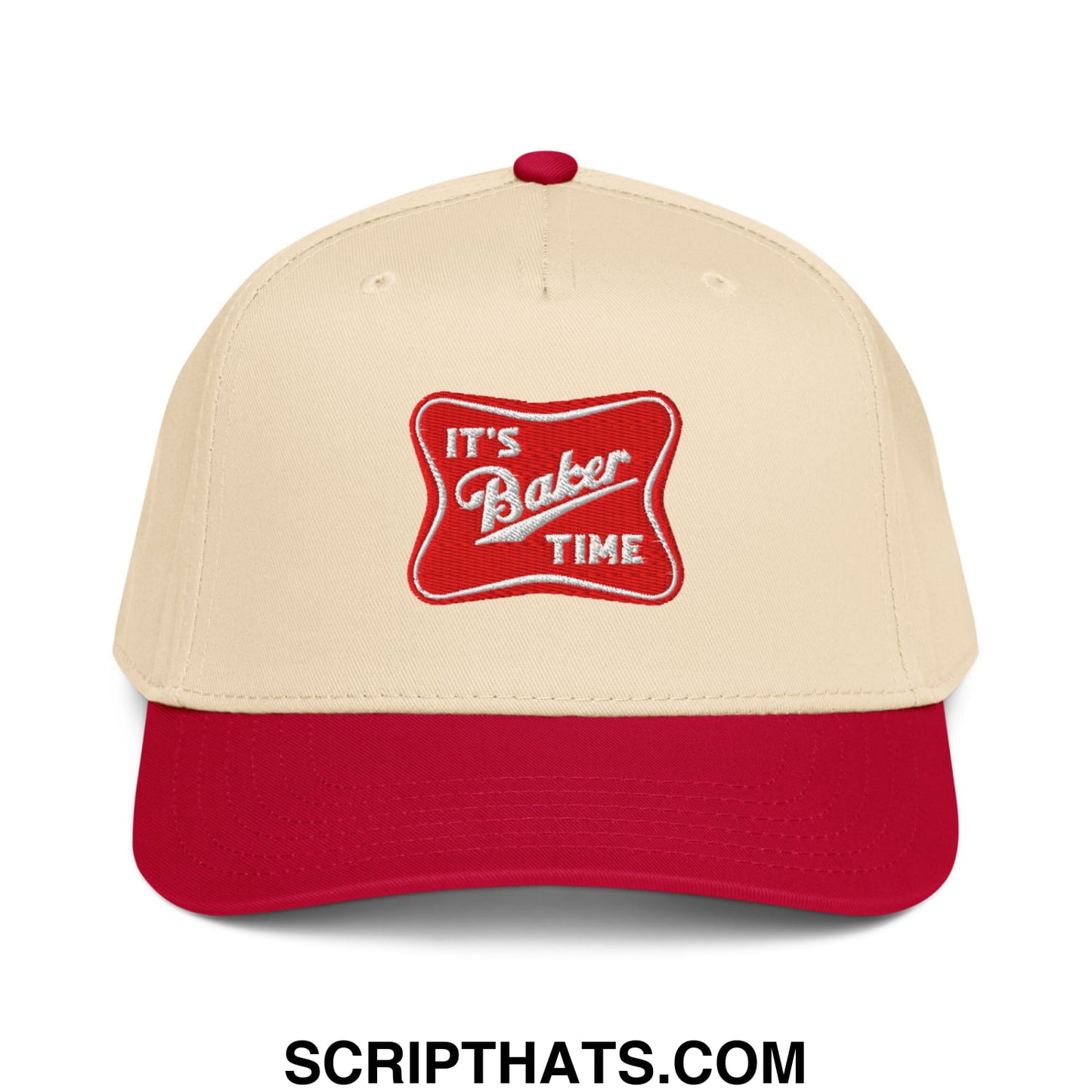 Cream-colored baseball snapback hat with red brim and button featuring embroidered its baker time patch in white script