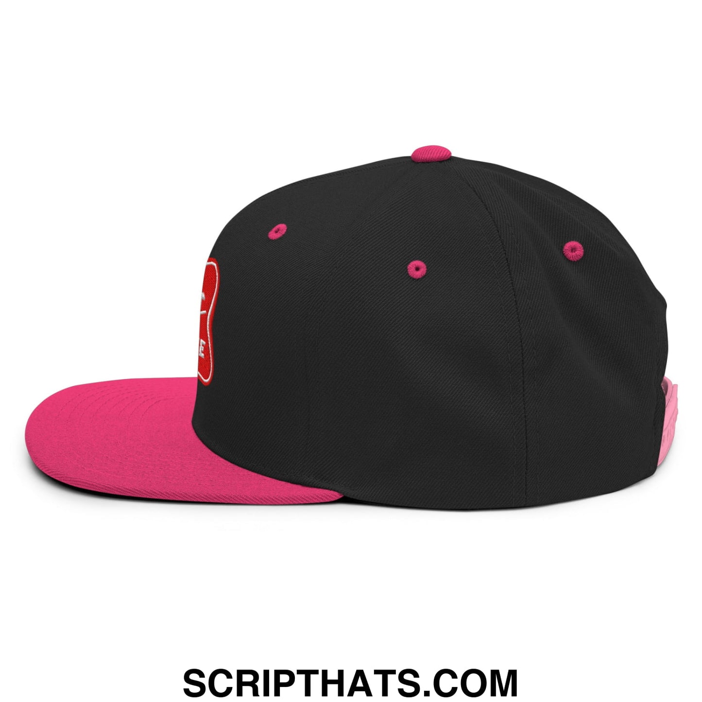 Black and pink snapback cap with a red embroidered logo on the side from the it’s baker time collection