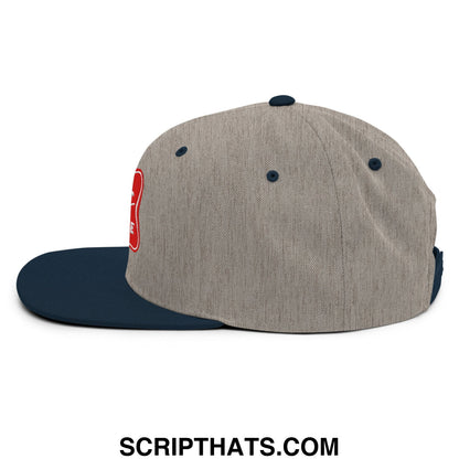 Gray and navy blue flat bill snapback hat with a red embroidered its baker time logo on the side