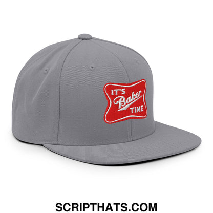 Gray flat bill snapback hat with a red embroidered patch reading its baker time in white lettering