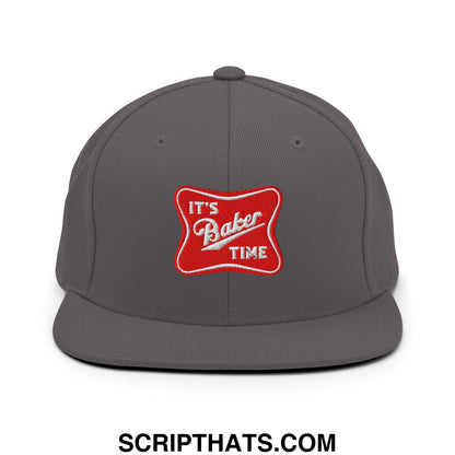 Gray snapback cap with red embroidered patch reading its baker time featuring a flat bill brim design